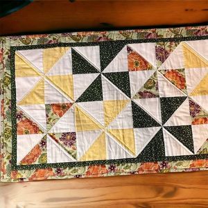 Handmade Valance Quilt pieced ,inside plain white Front is Multi colored triangl